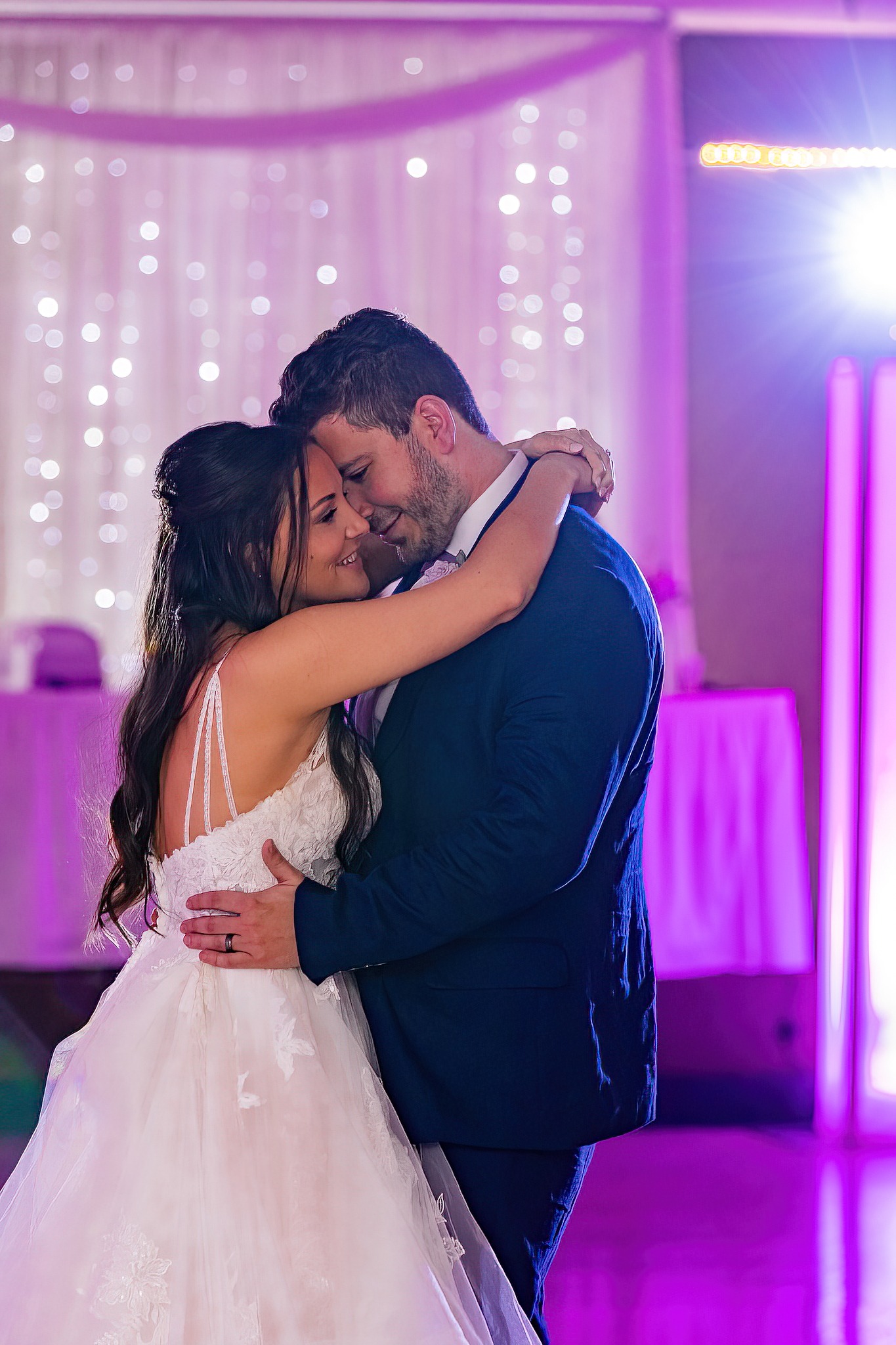 bride and groom dancing on dancefloor