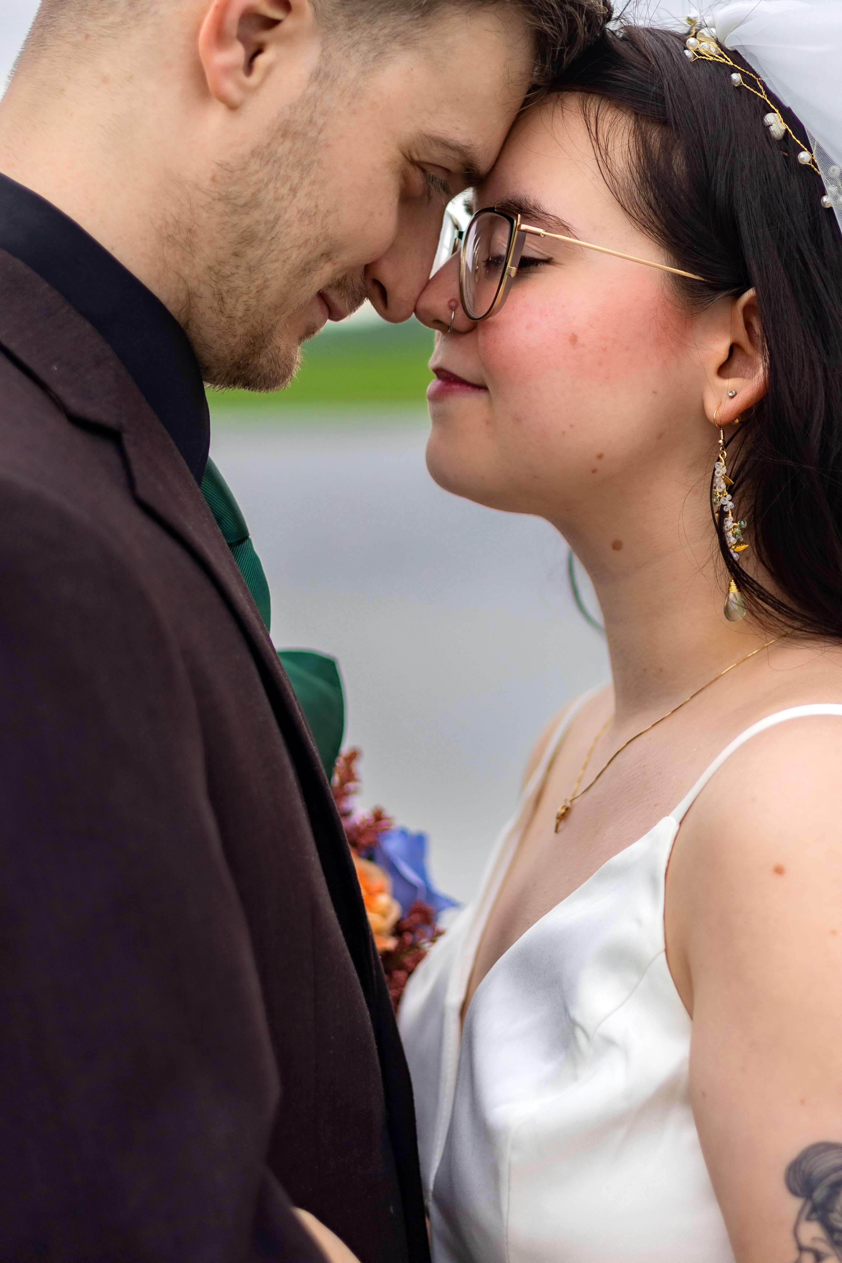 wedding portrait of bride and groom embracing