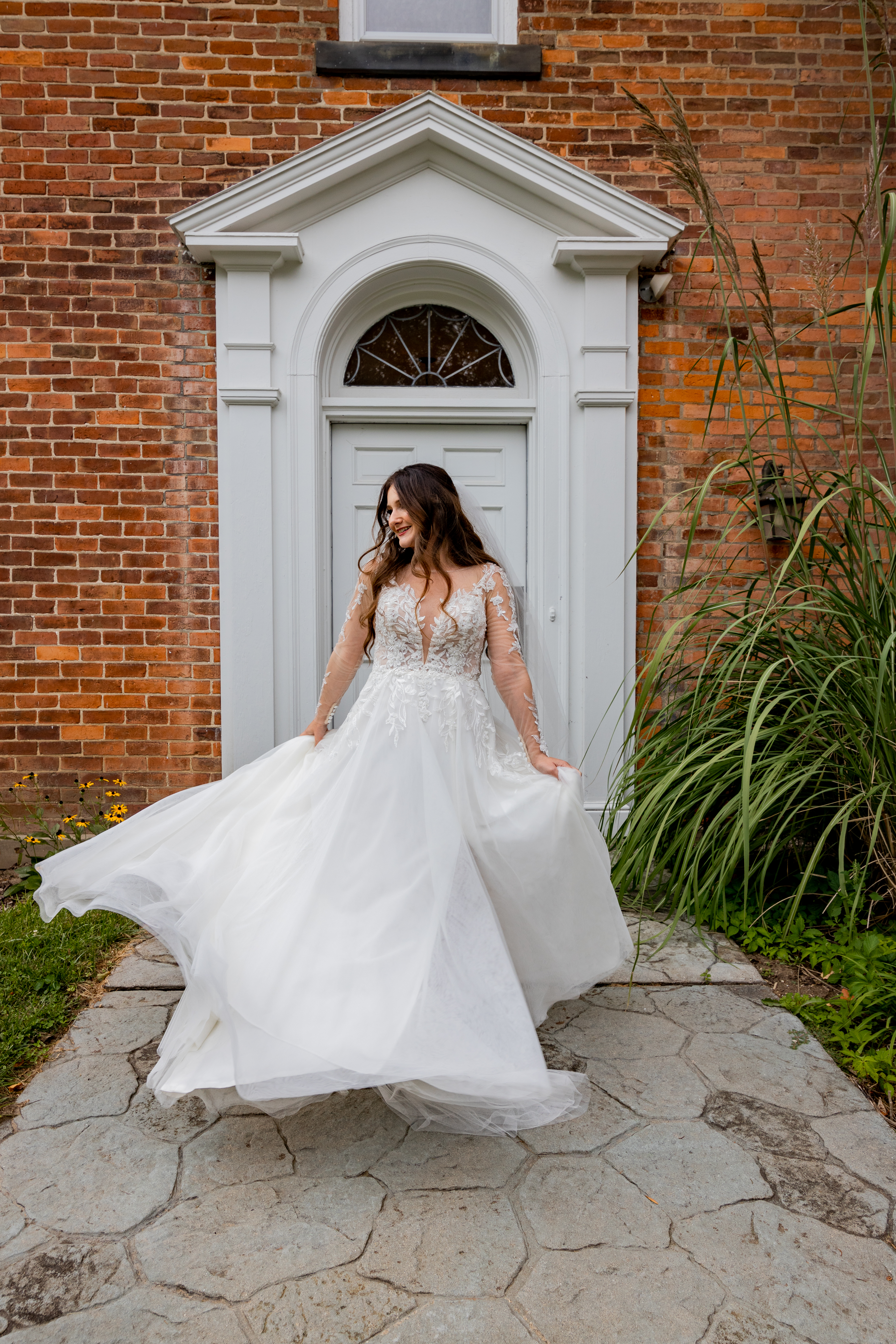 bride twirling wedding gown