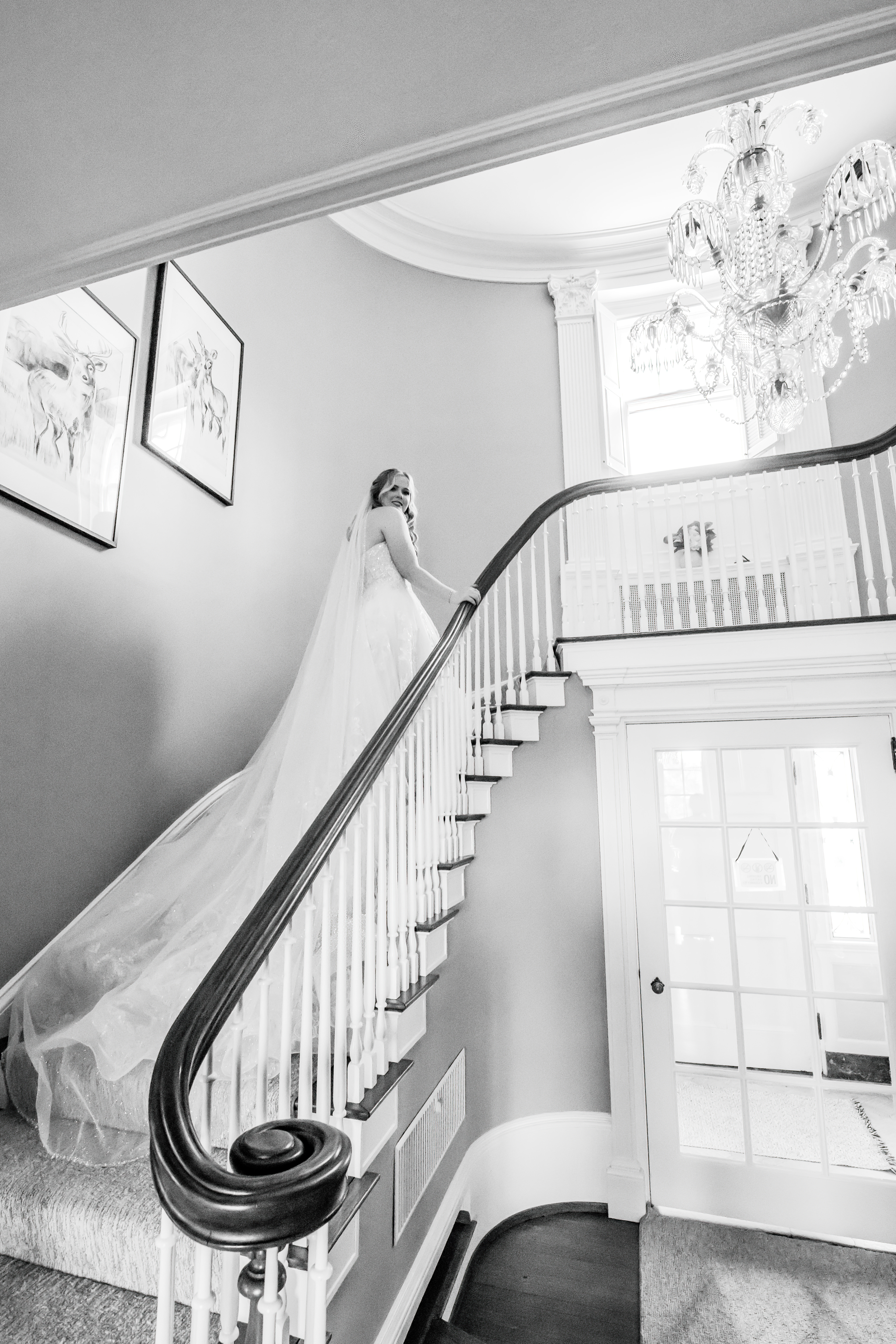black and white portrait of bride on stairwell