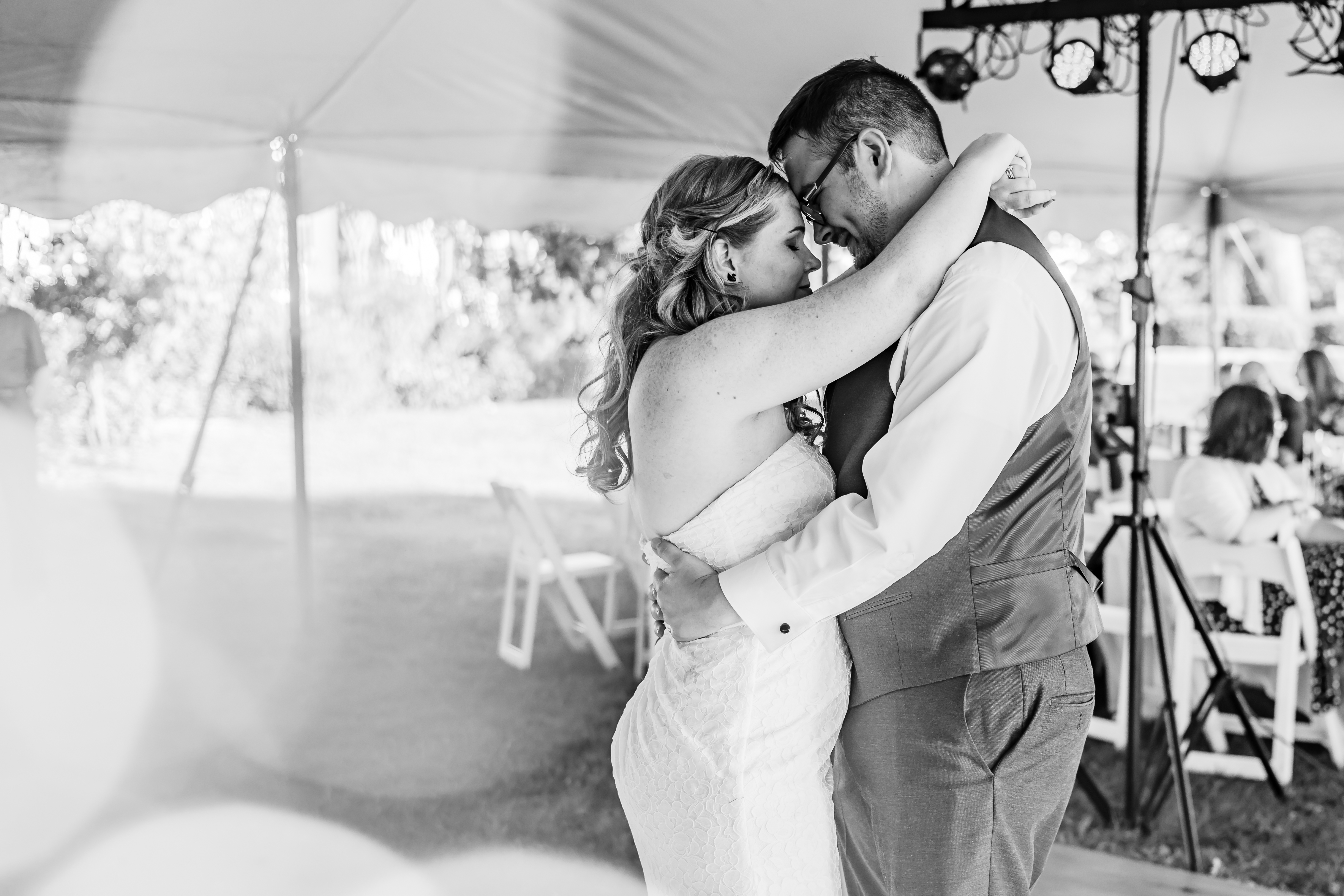 black and white portrait bride and groom's first dance