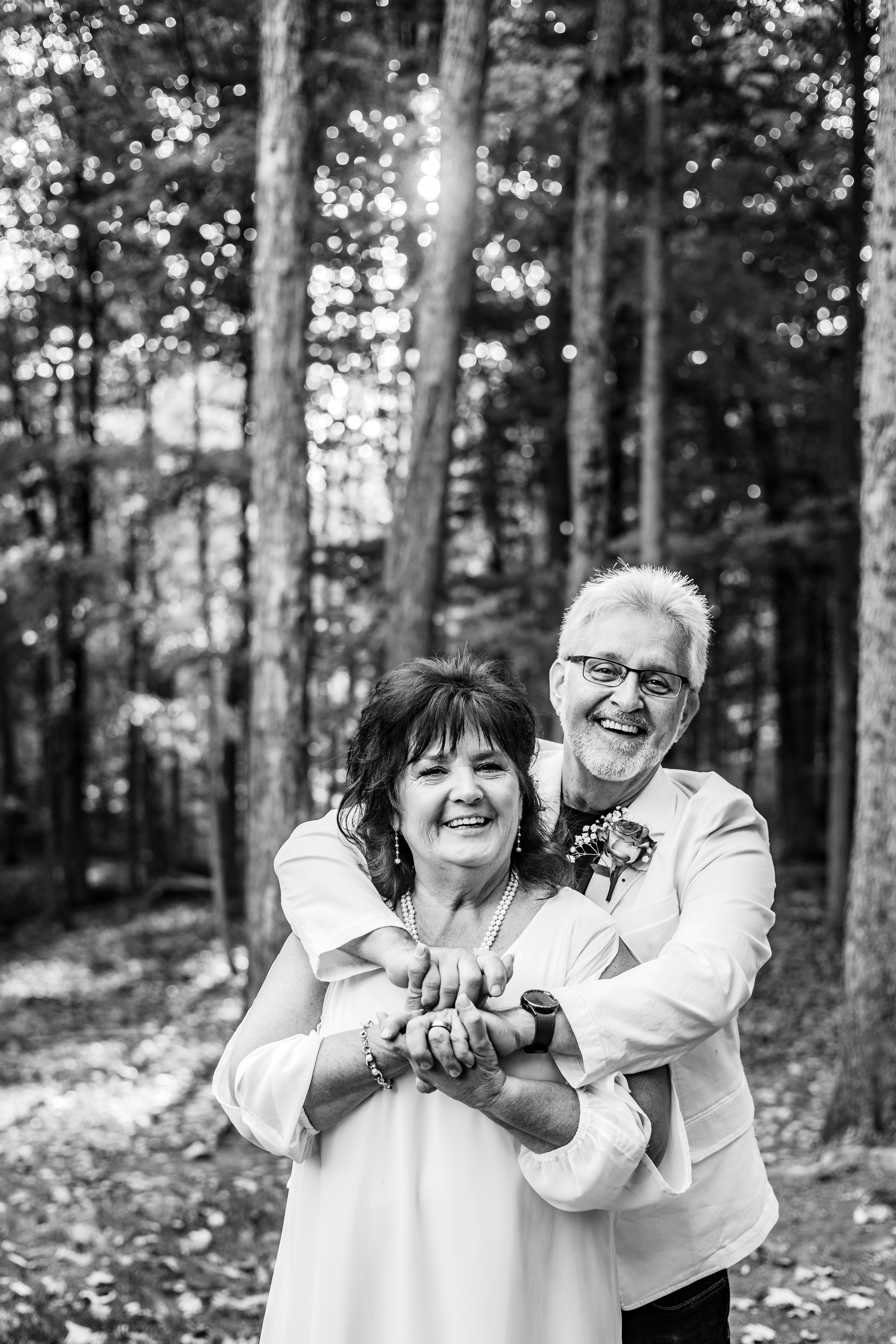 black and white portrait of couple embracing