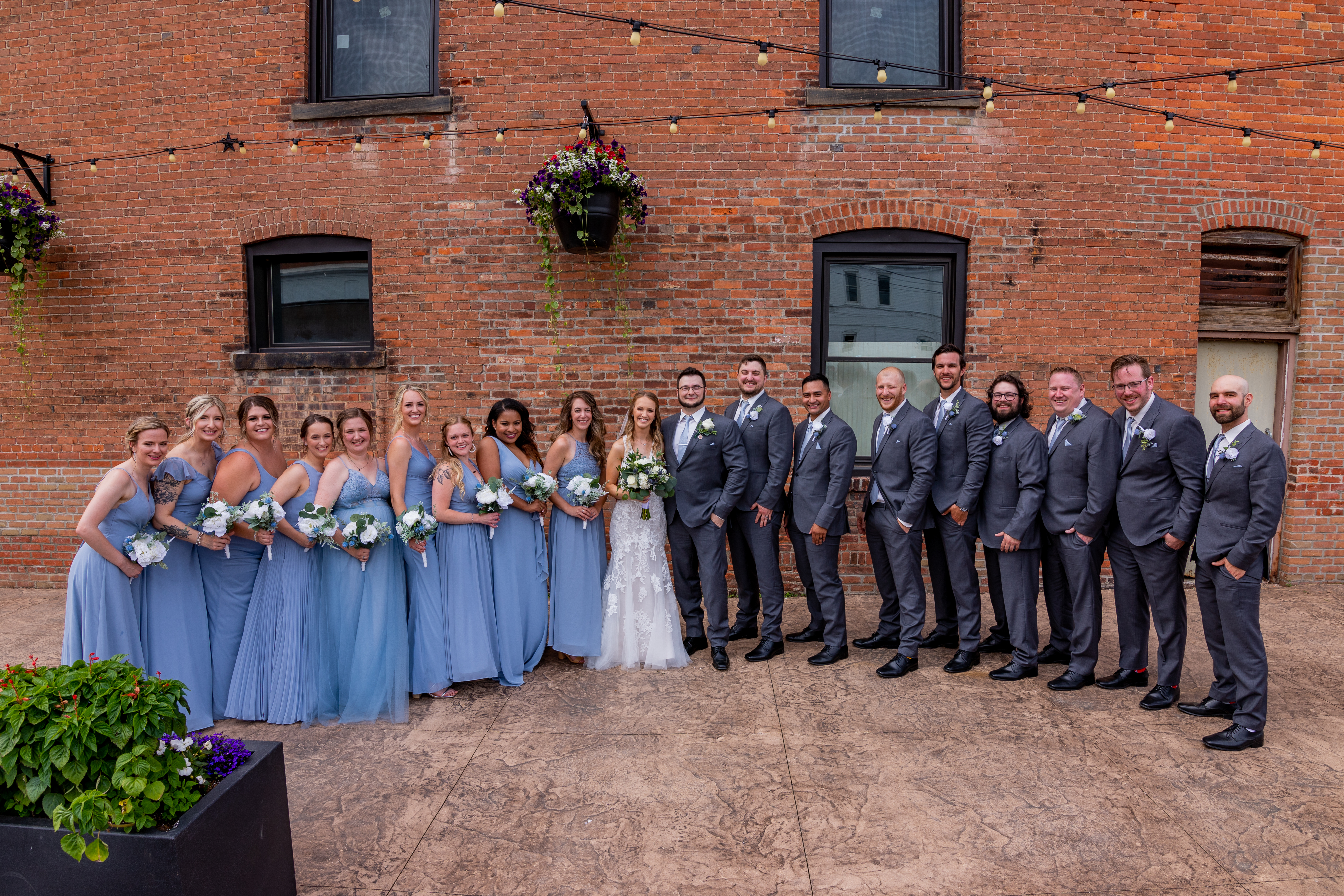 bride and groom with wedding party
